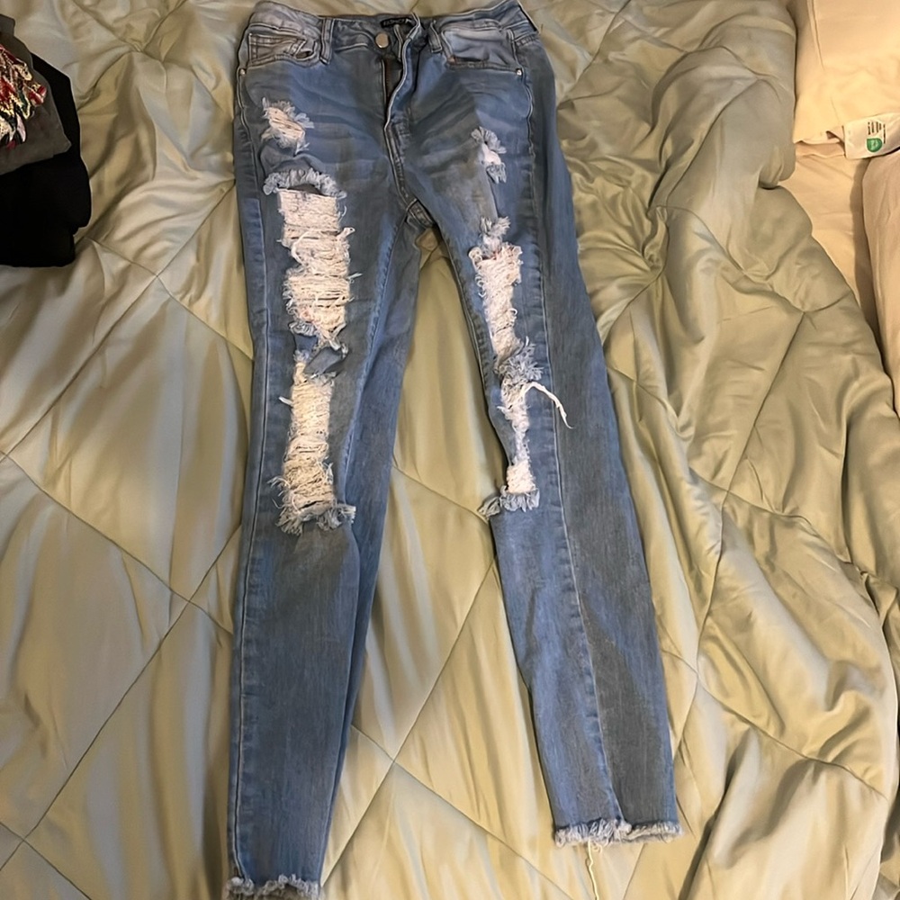 Distressed ripped jeans